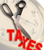 The word taxes being cut by scissors